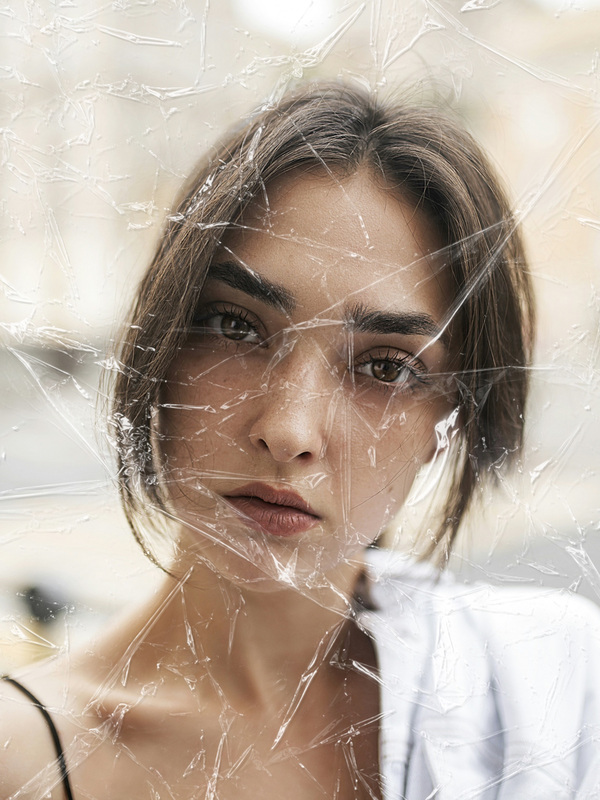 A close-up portrait · Clear Cellophane