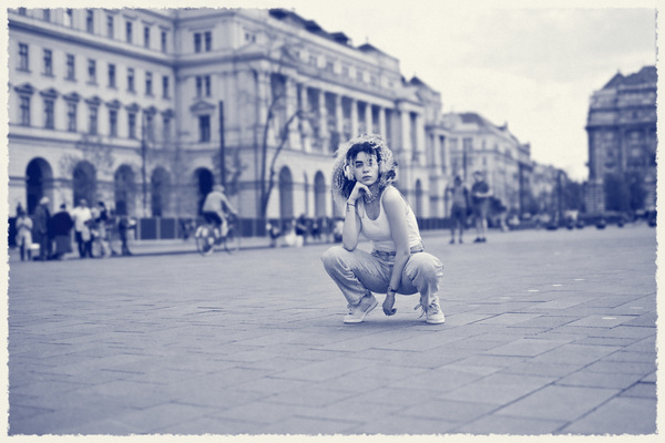 A person posing in a city square · Cyanotype Paper